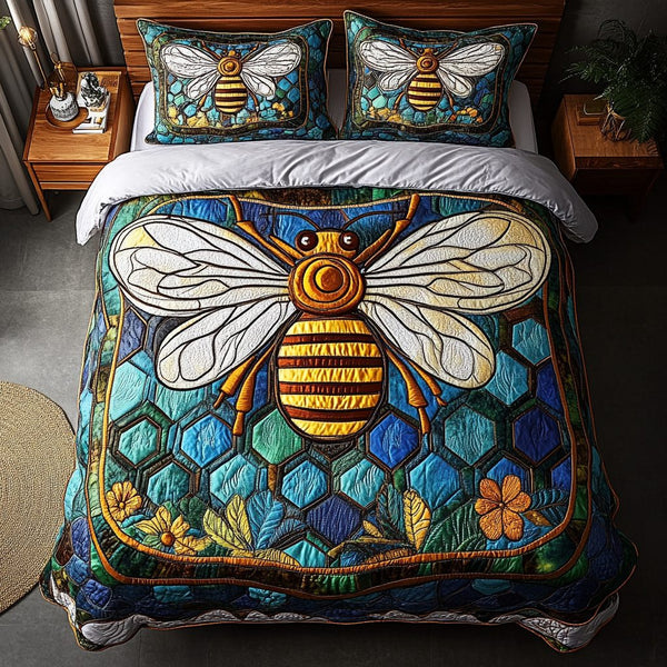 Sunlit Stripes quilted 3-piece bedding set on a made bed with two matching pillow shams