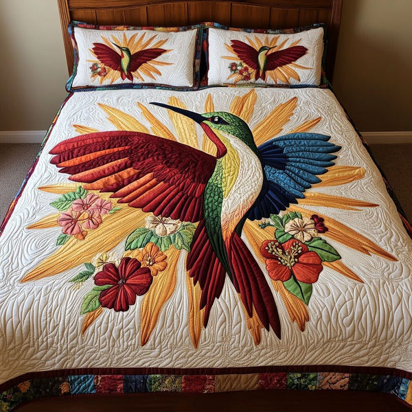 Sunlit Symphony quilted 3-piece bedding set on a made bed with two matching pillow shams