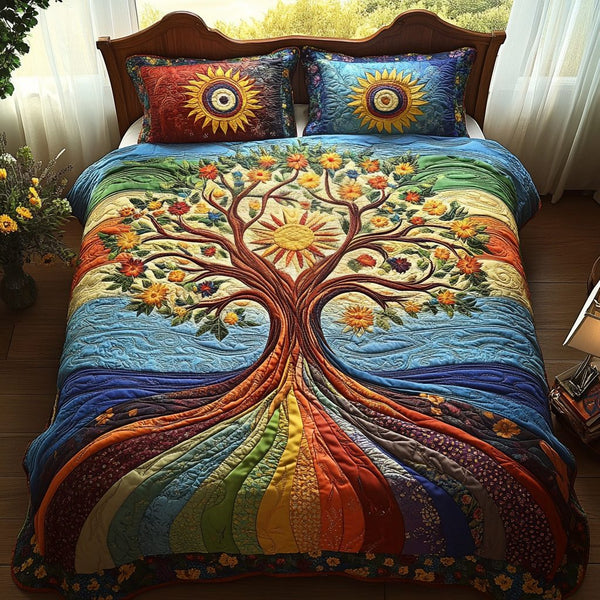 Sunlit Tree Meadow quilted 3-piece bedding set on a made bed with two matching pillow shams