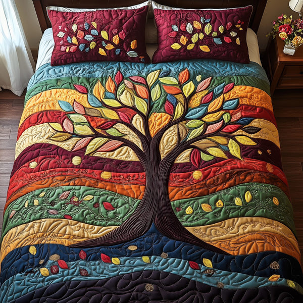 Sunlit Tree of Life quilted 3-piece bedding set on a made bed with two matching pillow shams