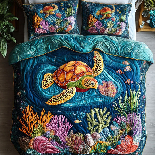 Sunlit Waters quilted 3-piece bedding set on a made bed with two matching pillow shams