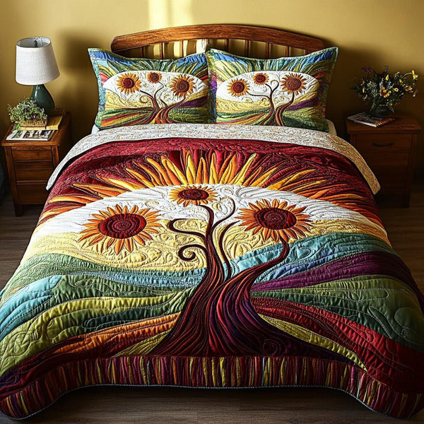 Sunny Blossom Escape quilted 3-piece bedding set on a made bed with two matching pillow shams