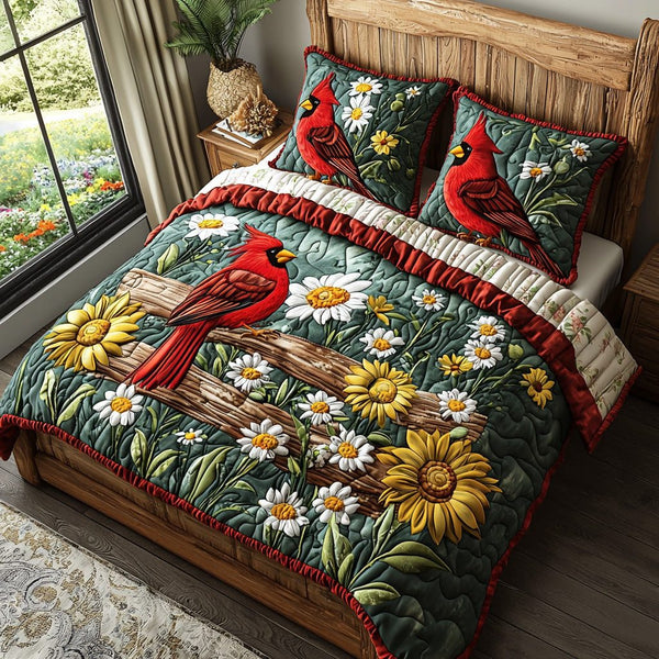 Sunny Cardinal quilted 3-piece bedding set on a made bed with two matching pillow shams