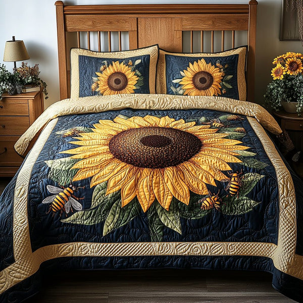 Sunny Haven quilted 3-piece bedding set on a made bed with two matching pillow shams