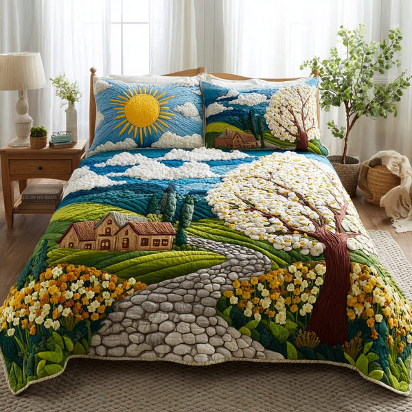Sunny Orchard quilted 3-piece bedding set on a made bed with two matching pillow shams