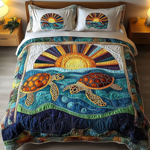 Sunny Shellscape quilted 3-piece bedding set on a made bed with two matching pillow shams