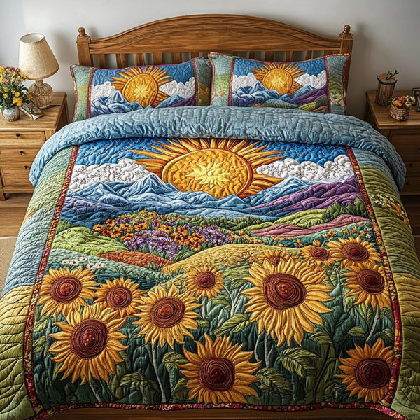 Sunrise Bliss quilted 3-piece bedding set on a made bed with two matching pillow shams