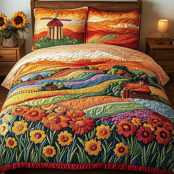 Sunrise Bliss quilted 3-piece bedding set on a made bed with two matching pillow shams