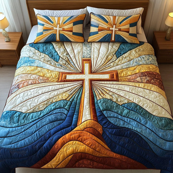 Sunrise Cross quilted 3-piece bedding set on a made bed in a softly lit bedroom