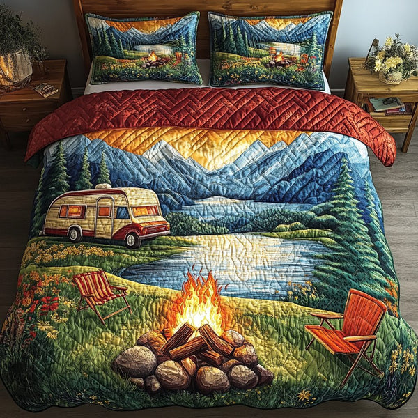 Sunrise Journey quilted 3-piece bedding set on a made bed with two matching pillow shams