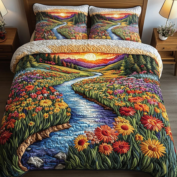 Sunrise River Valley quilted 3-piece bedding set on a made bed with two matching pillow shams
