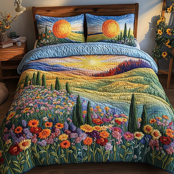 Sunset Bloom quilted 3-piece bedding set on a made bed with two matching pillow shams
