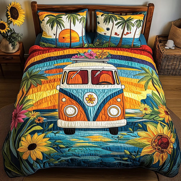 Sunset Bloom quilted 3-piece bedding set on a made bed with two matching pillow shams