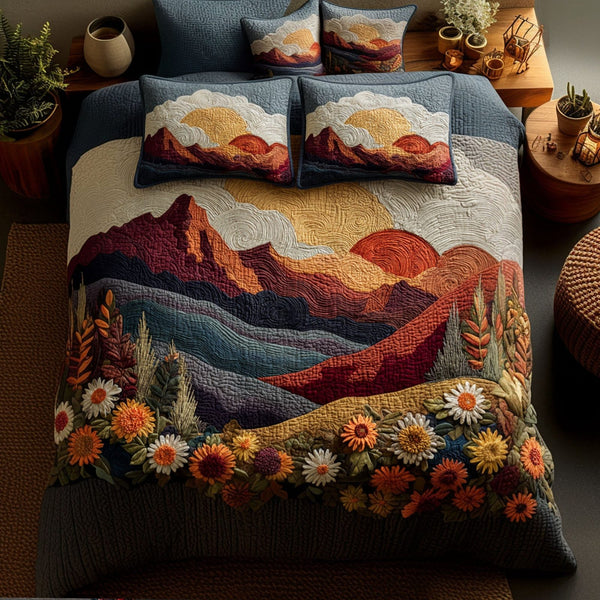 Sunset Blooms quilted 3-piece bedding set on a made bed with two matching pillow shams