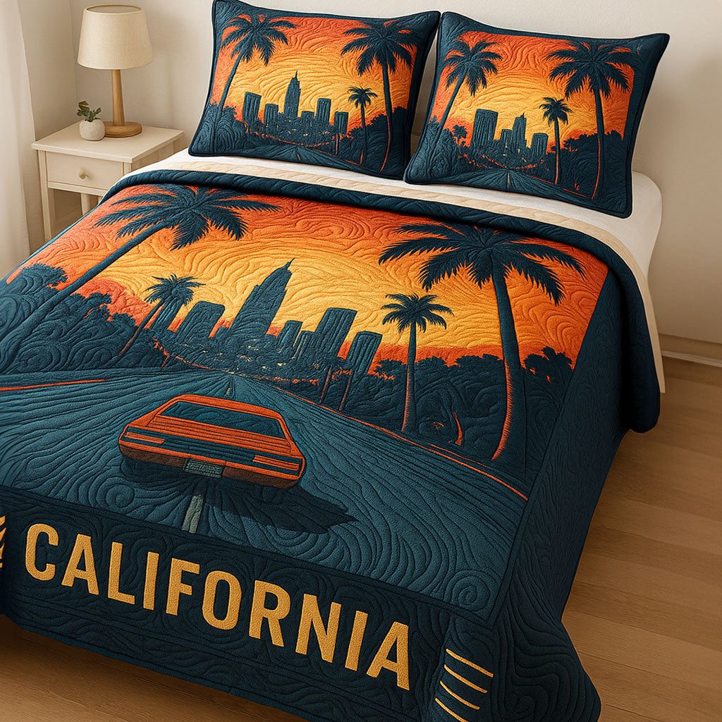 Sunset Boulevard quilted 3-piece bedding set on a made bed with two matching pillow shams