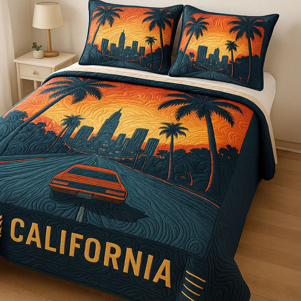 Sunset Boulevard quilted 3-piece bedding set on a made bed with two matching pillow shams