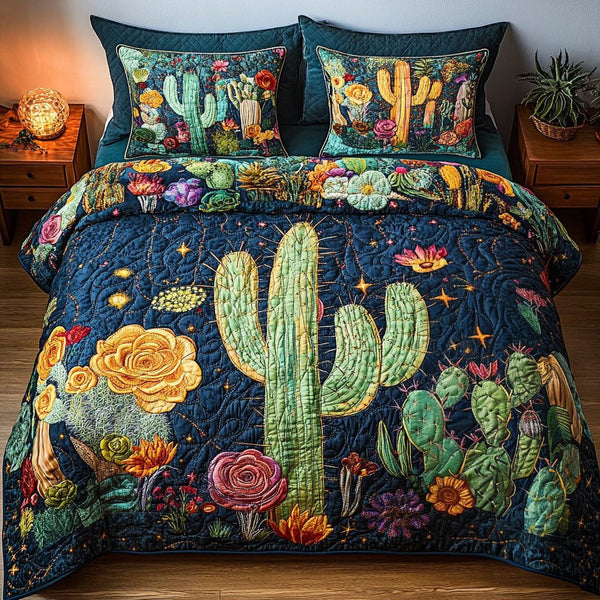 Sunset Cacti quilted 3-piece bedding set on a made bed with two matching pillow shams