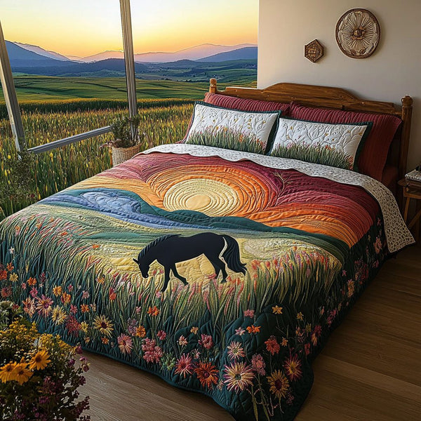 Sunset Canter quilted 3-piece bedding set on a made bed with two matching pillow shams