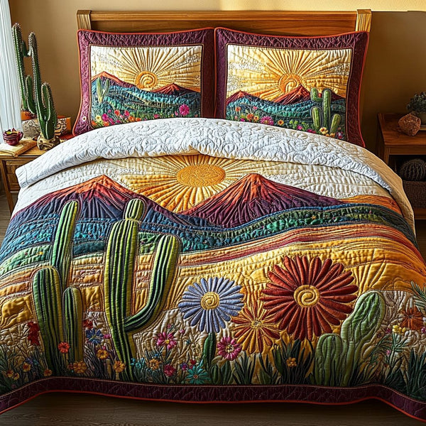 Sunset Canyon quilted 3-piece bedding set on a made bed with two matching pillow shams