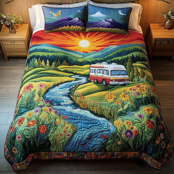 Sunset Caravan quilted 3-piece bedding set on a made bed with two matching pillow shams