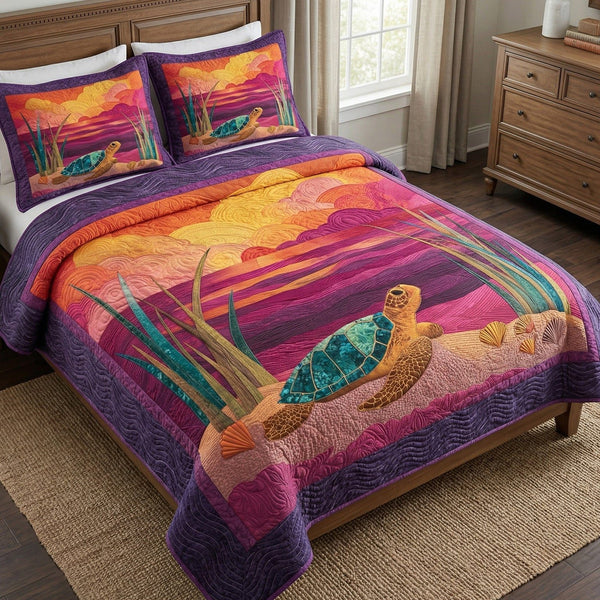 Sunset Coast quilted 3-piece bedding set on a made bed with two matching pillow shams