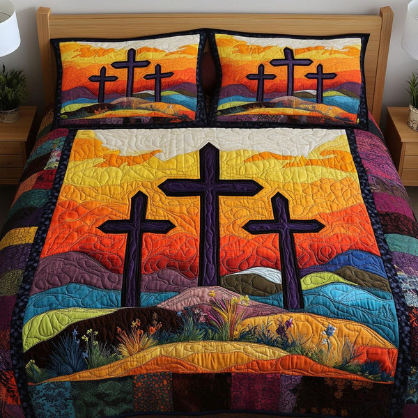 Sunset Crosses quilted 3-piece bedding set on a made bed in a softly lit bedroom