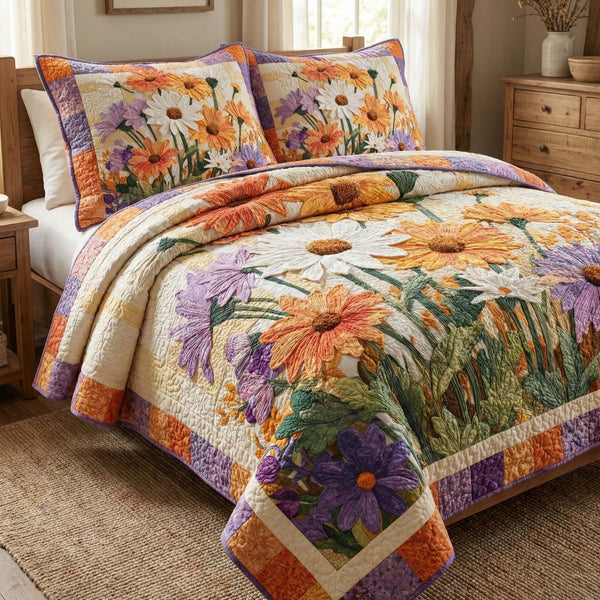 Sunset Daisies quilted 3-piece bedding set on a made bed with two matching pillow shams