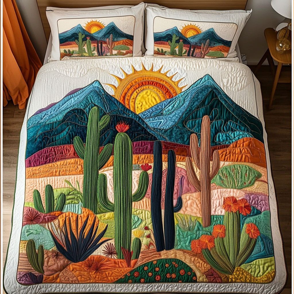 Sunset Desert Cactus quilted 3-piece bedding set on a made bed with two matching pillow shams