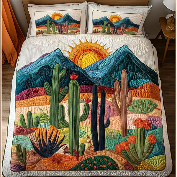 Sunset Desert Cactus quilted 3-piece bedding set on a made bed with two matching pillow shams