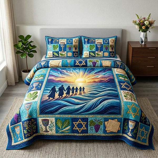 Sunset Exodus quilted 3-piece bedding set on a made bed with two matching pillow shams
