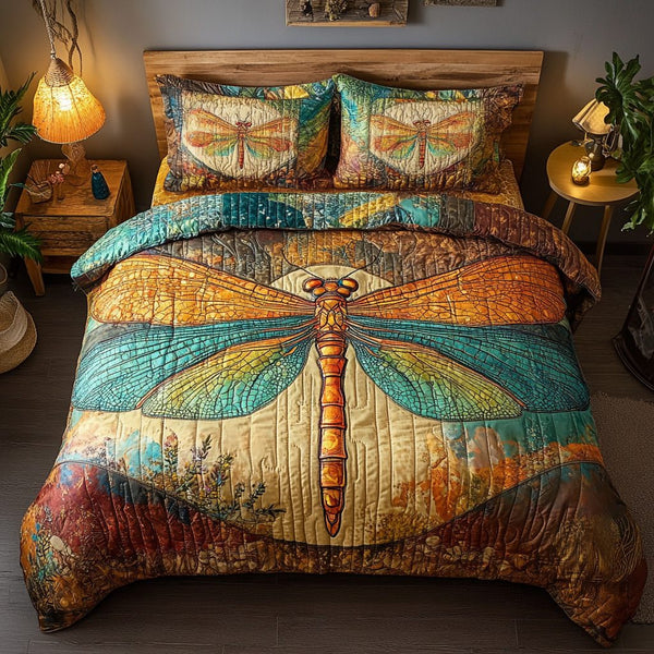 Sunset Flight Harmony quilted 3-piece bedding set on a made bed with two matching pillow shams
