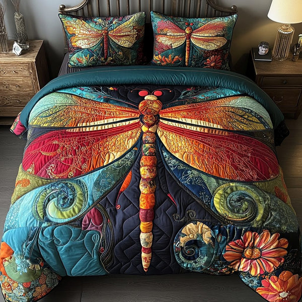 Sunset Flutter quilted 3-piece bedding set on a made bed with two matching pillow shams