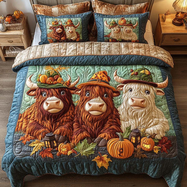 Sunset Graze quilted 3-piece bedding set on a made bed with two matching pillow shams
