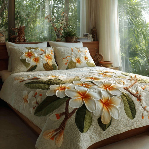 Sunset Grove quilted 3-piece bedding set on a made bed with two matching pillow shams
