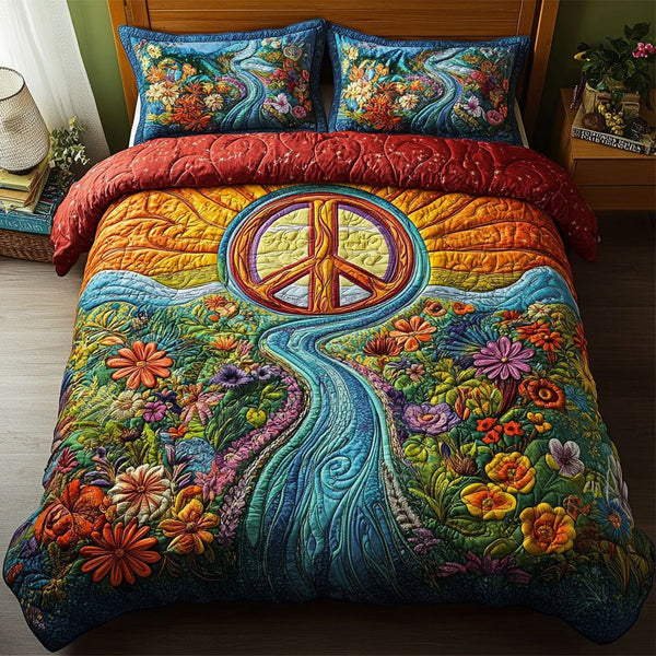 Sunset Harmony quilted 3-piece bedding set on a made bed with two matching pillow shams