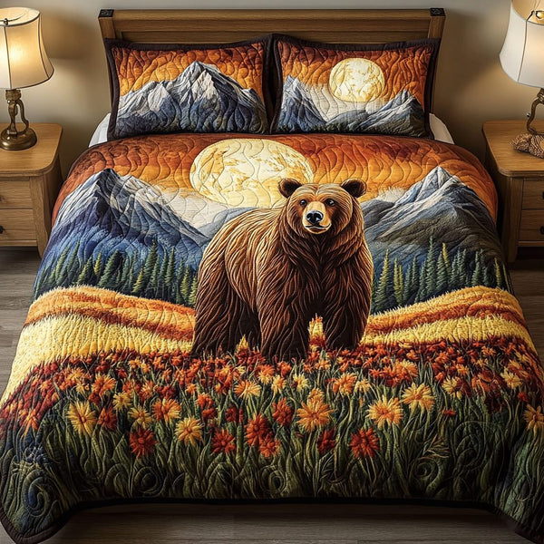 Sunset Haven quilted 3-piece bedding set on a made bed with two matching pillow shams