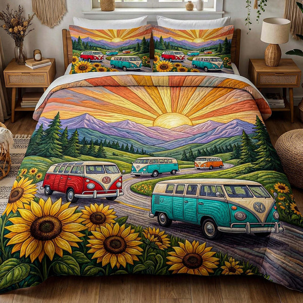 Sunset Journey quilted 3-piece bedding set on a made bed with two matching pillow shams