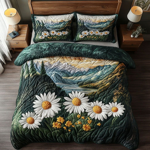Sunset Meadow quilted 3-piece bedding set on a made bed with two matching pillow shams