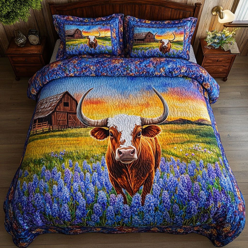 Sunset Meadows quilted 3-piece bedding set on a made bed with two matching pillow shams
