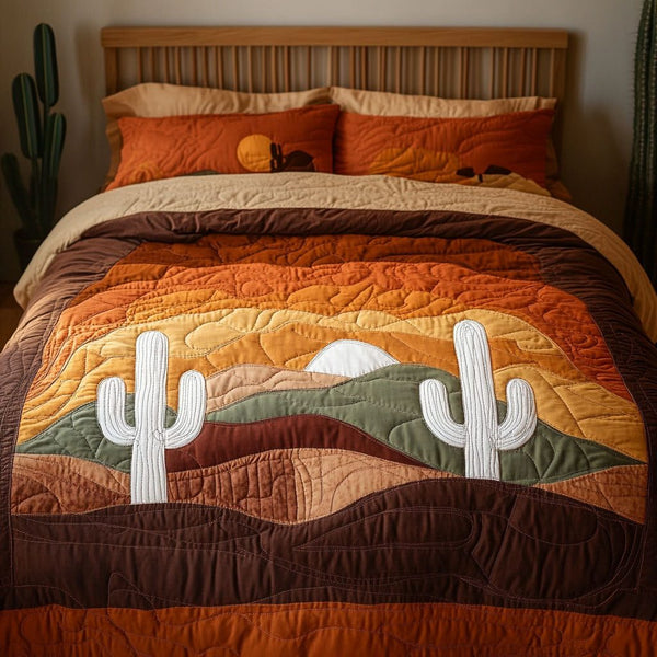 Sunset Mirage quilted 3-piece bedding set on a made bed with two matching pillow shams