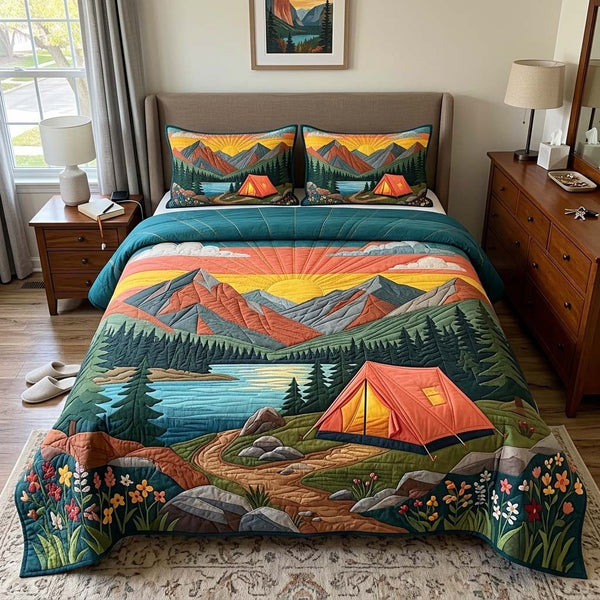 Sunset Mountain quilted 3-piece bedding set on a made bed with two matching pillow shams