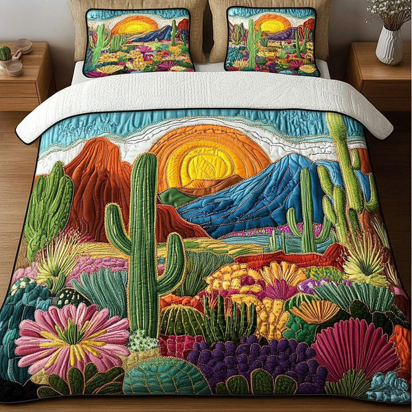 Sunset Oasis quilted 3-piece bedding set on a made bed with two matching pillow shams