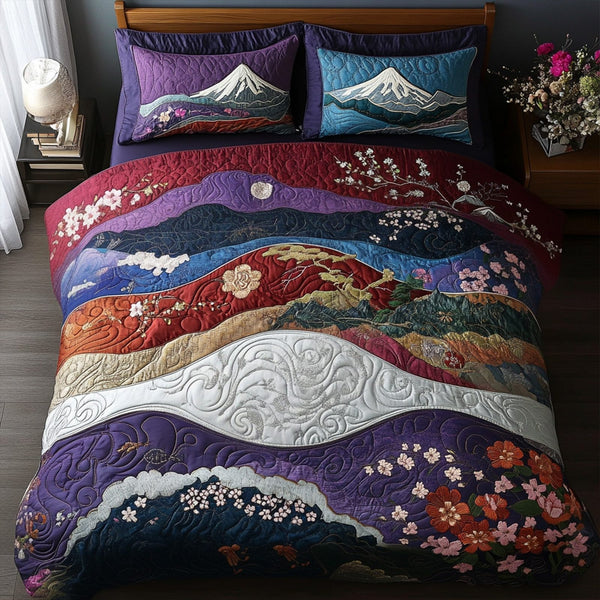 Sunset over Mount Fuji quilted 3-piece bedding set on a made bed with two matching pillow shams