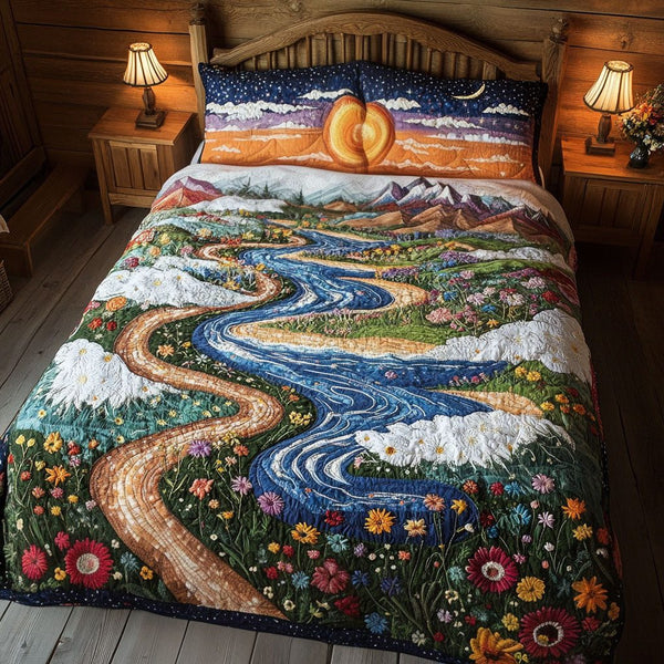 Sunset Over the Hills quilted 3-piece bedding set on a made bed with two matching pillow shams