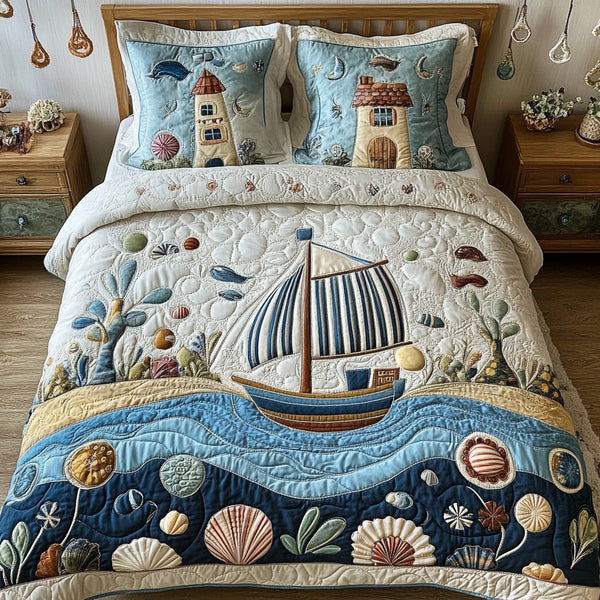 Sunset Over the Sea quilted 3-piece bedding set on a made bed in a light coastal bedroom