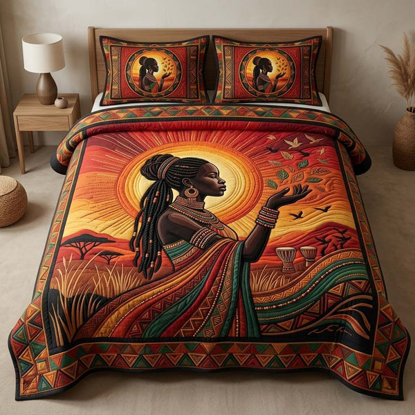 Sunset Queen quilted 3-piece bedding set on a made bed with two matching pillow shams