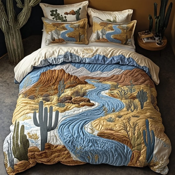 Sunset River quilted 3-piece bedding set on a made bed with two matching pillow shams