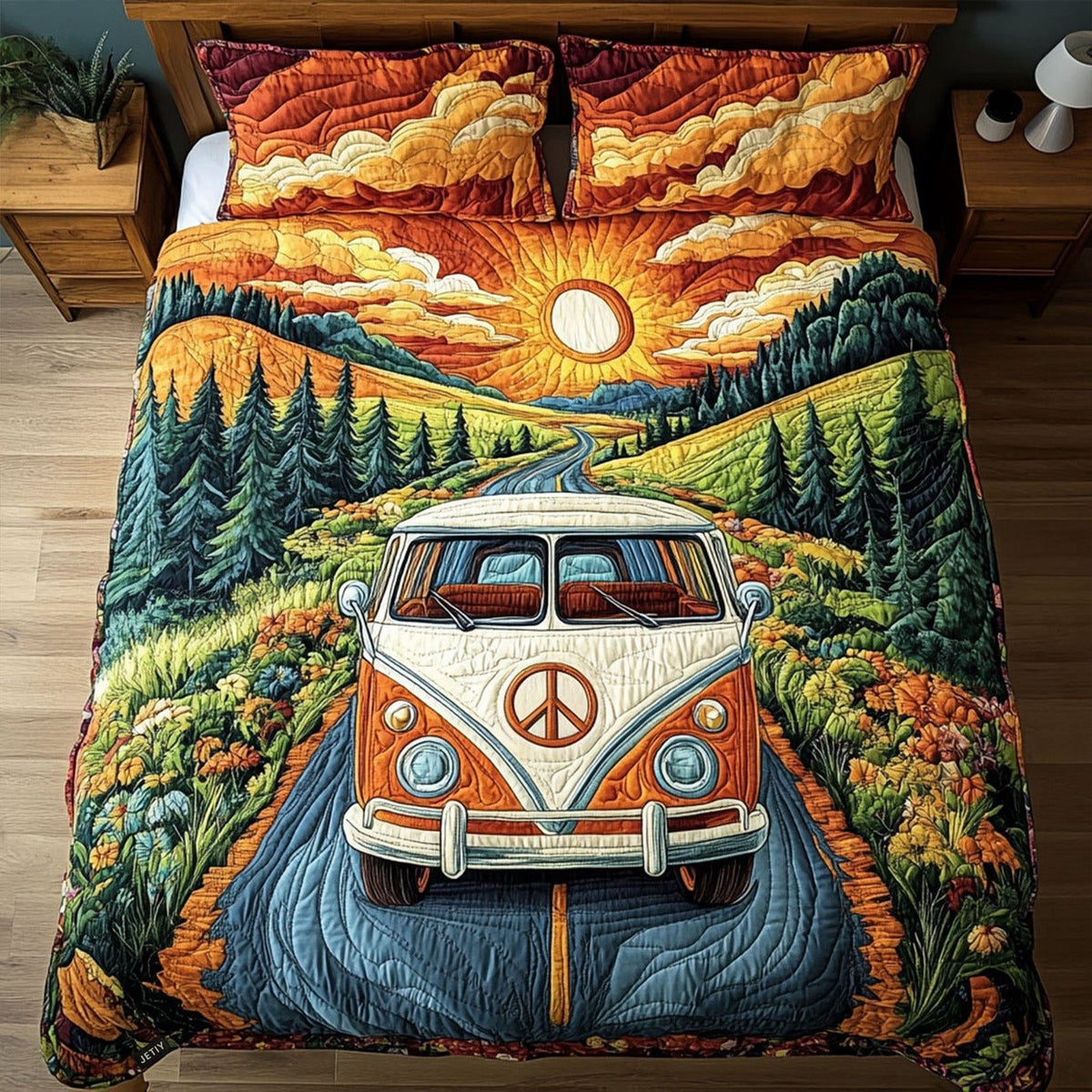 Sunset Roadtrip quilted 3-piece bedding set on a made bed with two matching pillow shams