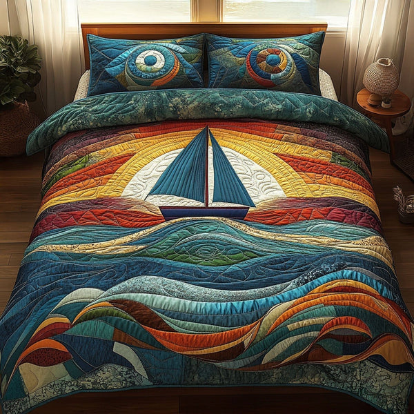 Sunset Sails quilted 3-piece bedding set on a made bed with two matching pillow shams