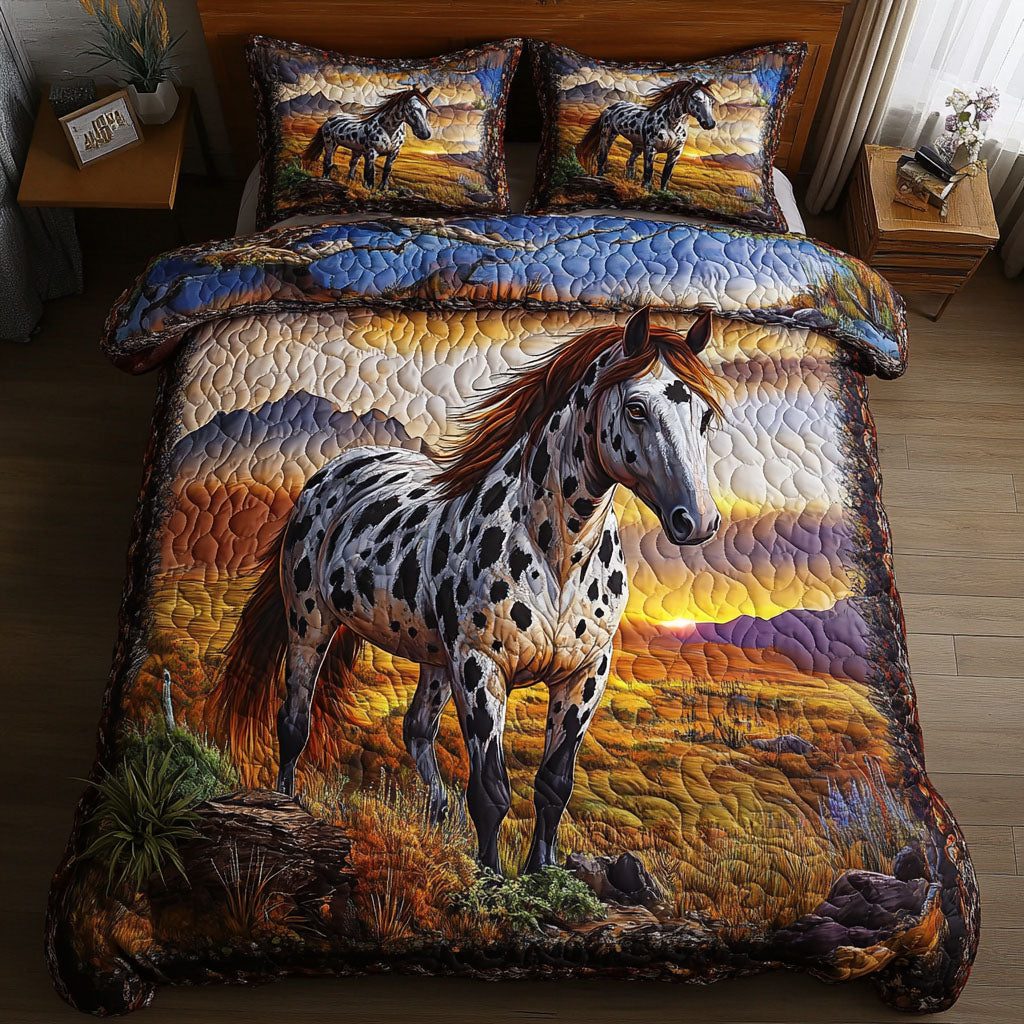 Sunset Sentinel quilted 3-piece bedding set on a made bed with two matching pillow shams